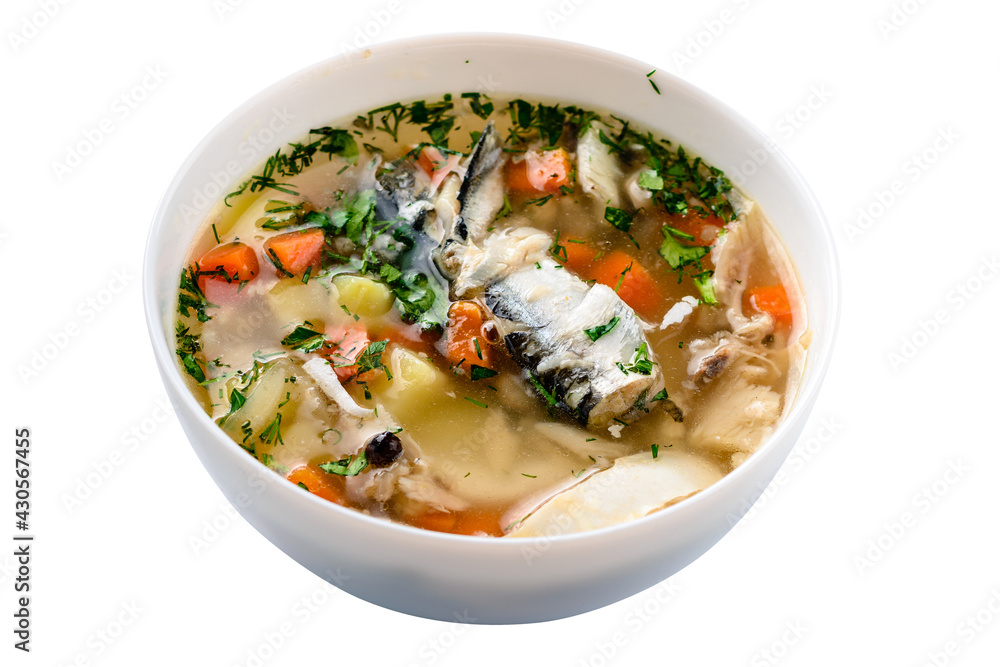Hot tasty healthy soup with fish and vegetables served on a round plate Hot tasty healthy soup with fish and vegetables served on a round plate