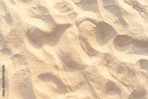 Sand texture background on the beach. Light beige sea sand texture pattern. © Lifestyle Graphic