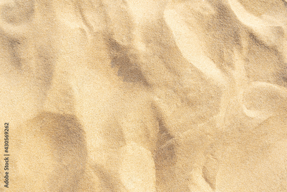 Sand texture background on the beach. Light beige sea sand texture pattern. Sand texture background on the beach. Light beige sea sand texture pattern.