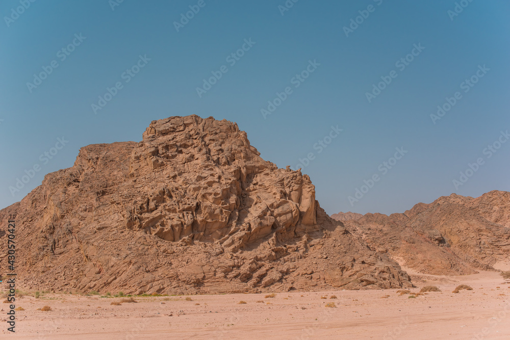 Tourism in Egypt and Africa view on a desert sands, vacation and travelling concept Tourism in Egypt and Africa view on a desert sands, vacation and travelling concept