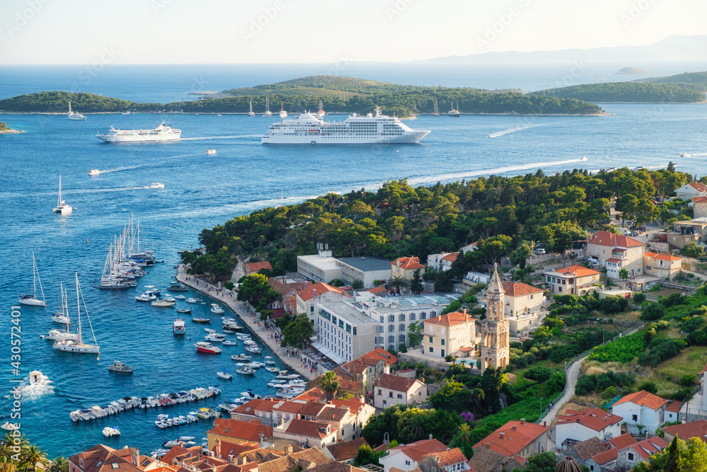 Hvar island, Croatia. Marina. View of the town from the castle. Landscape in summer time. Bay with yachts and boats.