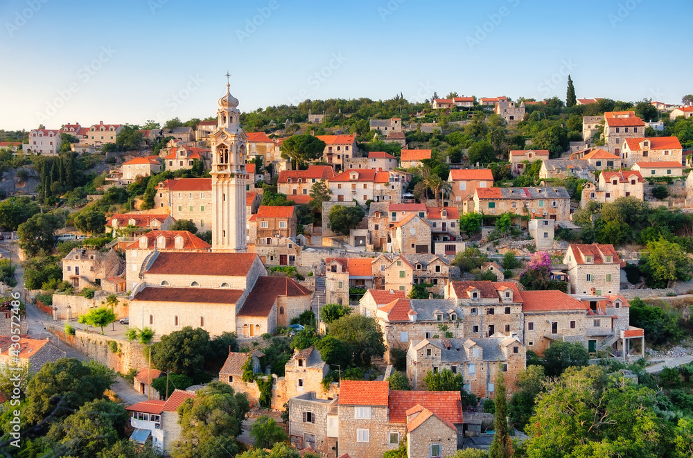 Croatia. Ols town as a background. Houses on the mountain hill during sunset. Landscape in Croatia. Travel and vacation image