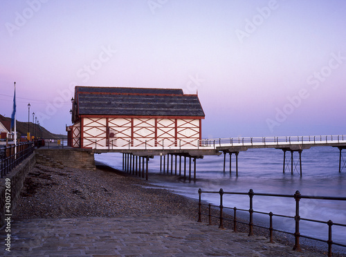 Taken on Fuji Velvia slide film, the sun begins to rise on a cold Autumn morning at Saltburn.