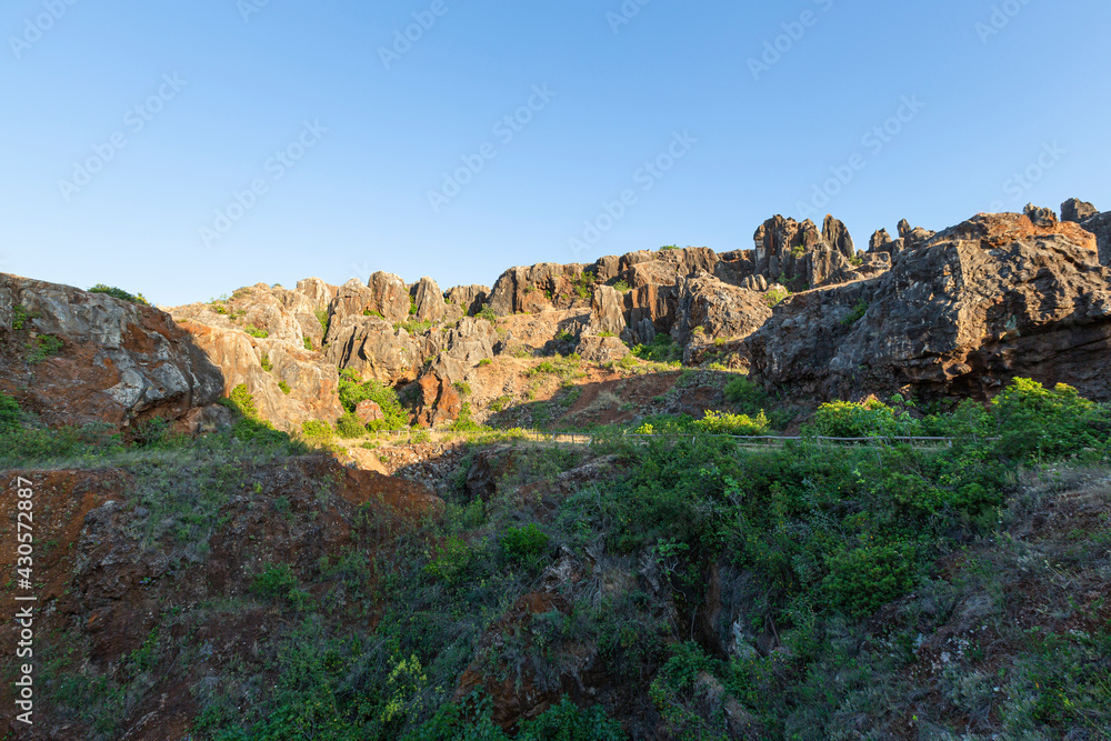 Obraz premium The Iron Hill (Cerro del Hierro), eroded landscape of some old abandoned mines in the Sierra Norte of Seville Natural Park, Andalusia, Spain