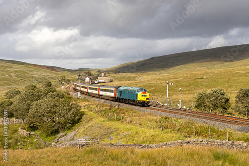 Class 40 No. 40145 rolls towards ribblehead Viaduct past Blea Moor box working 1Z44 14:38 Appleby to Skipton service.