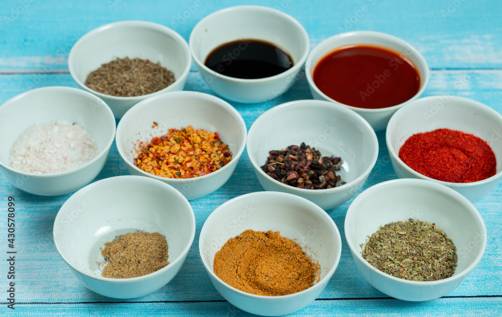 Indian and Pakistani spices in mini cups on a table Indian and Pakistani spices in mini cups on a table