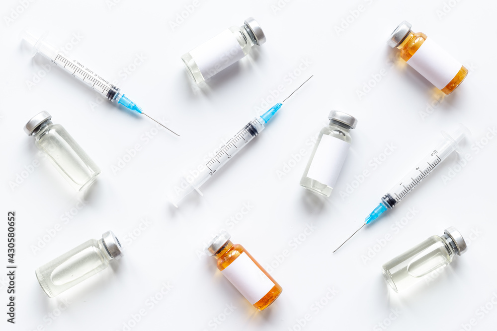 Vaccine vial dose with with syringe. Vaccination concept Vaccine vial dose with with syringe. Vaccination concept
