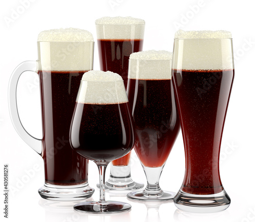 Set of fresh stout beer glasses with bubble froth isolated on white background.