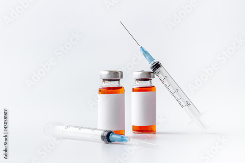 Vaccine vial dose with with syringe. Vaccination concept