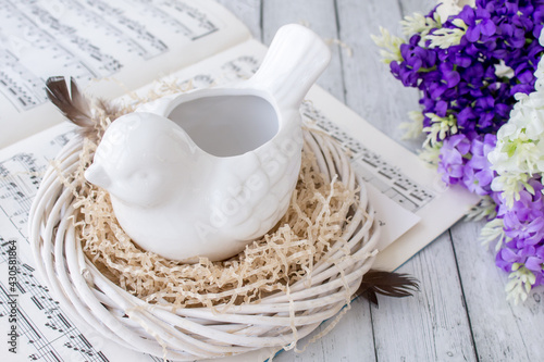 Easter decoration with bird and lilac, inspiration concept