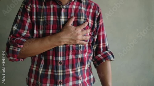 A man with severe chest pain. Heart failure photo