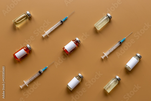 Vaccination concept. Vaccine vial dose with with syringe