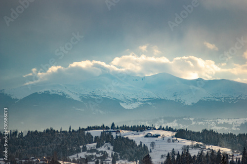 Winter in the mountains - small Ukrainian village in the Carpathians