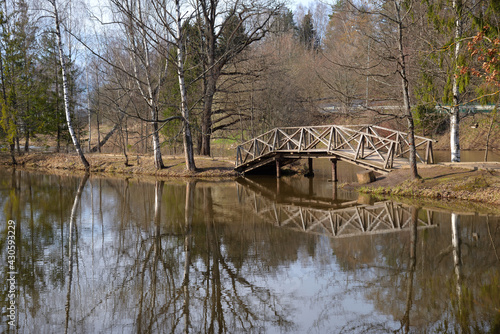 Lower pond with wooden bridges in spring park  Abramtsevo Museum  Abramtsevo  near town of Sergiev Posad  Moscow  region  Russia