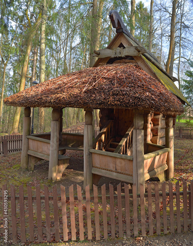 Wooden gazebo from log house called 