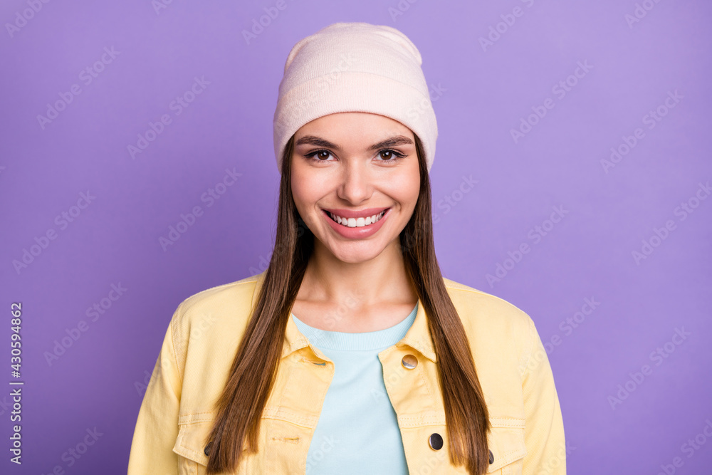 Photo portrait of smiling wearing casual outfit girl isolated on bright violet color background Photo portrait of smiling wearing casual outfit girl isolated on bright violet color background