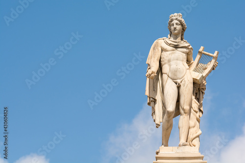 The statue of Apollo. Member of the Twelve Olympians  God of oracles  healing  archery  music and arts  sunlight  knowledge  herds and flocks  and protection of the young. Athens  Greece