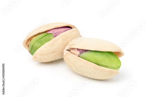 Close-up Pair of pistachio nuts isolated on a white background. Clipping path
