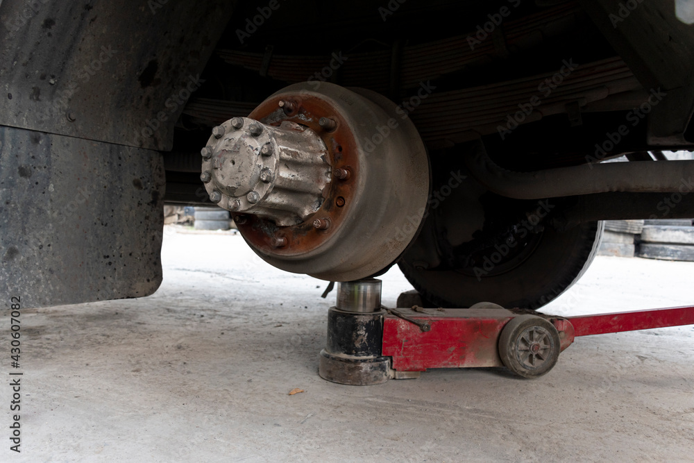 Truck change wheels using a lifting jack.