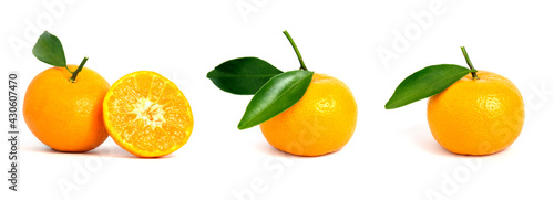 Group of Citrus sinensis ( called jeruk baby santang ) with leaves isolated on white background – local fresh fruit from Indonesia