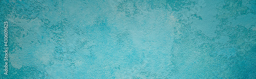 Beautiful abstract grunge decorative light blue cyan painted stucco wall texture. Handmade rough paper white background with copy space, wide layout