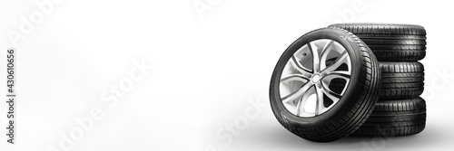 summer tires and wheels-stack on white background, new wheels long blank layout copyspace photo