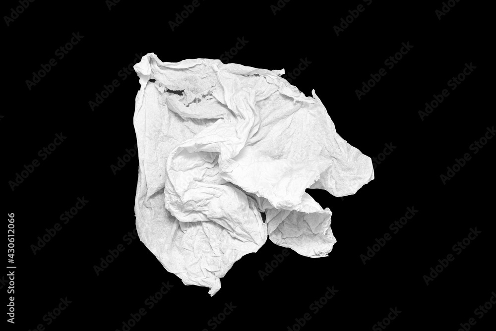 Crumpled napkin, used wet towel isolated on black Crumpled napkin, used wet towel isolated on black