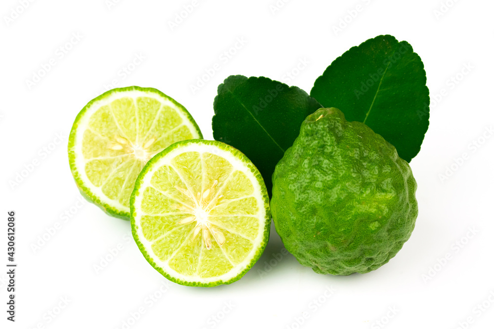 Bergamot fruit and green leaf isolated on white background. Bergamot fruit and green leaf isolated on white background.