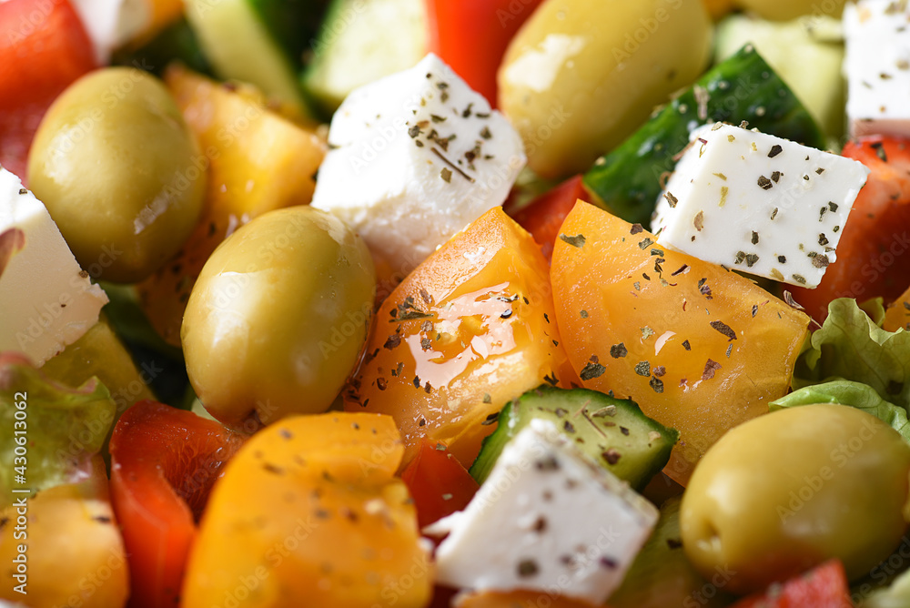Fresh vegetable salad with olives and feta for lunch in a beautiful plate
Fresh vegetable salad with olives and feta for lunch in a beautiful plate