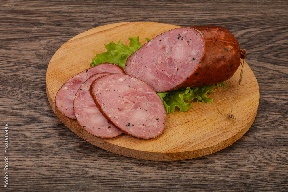 Smoked ham sausage with spices Smoked ham sausage with spices
