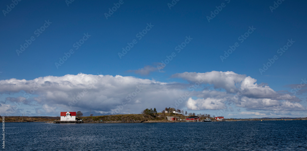 City walk and spring in the air, with white clouds - Here Brønnøysund harbor and Buholmen island,Helgeland,Nordland county,Norway,scandinavia,Europe