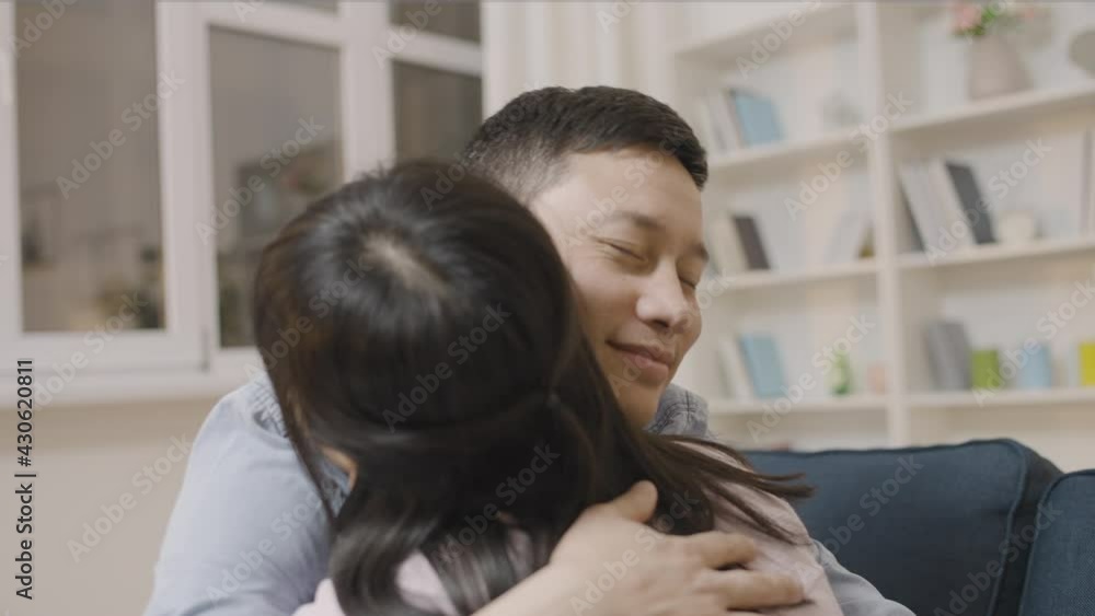 Asian young man hugging girlfriend, love relationship in couple, happy together Asian young man hugging girlfriend, love relationship in couple, happy together