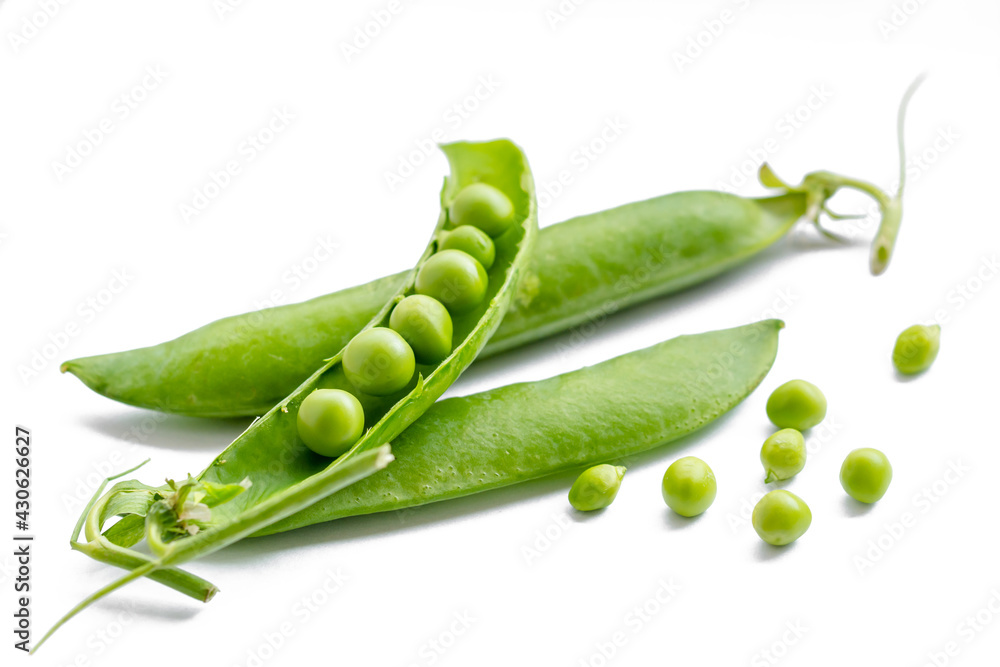 Fresh green peas on a white background Fresh green peas on a white background
