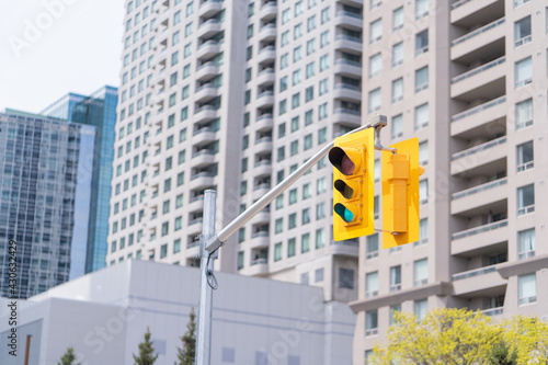 Photography Yellow Traffic Light on a sunny on a suuny day in Toronto Ontario Canada