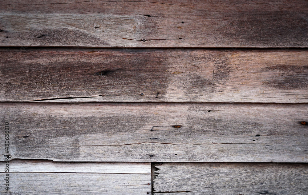 Wooden texture pattern abstract background can be use brochure cover page or articles background also have copy space for text. Wooden boards from which the wall of the house is made. Wooden texture pattern abstract background can be use brochure cover page or articles background also have copy space for text. Wooden boards from which the wall of the house is made.