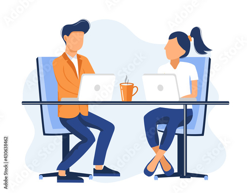 Job interview conversation. HR manager and employee candidate meeting and talking. Man and woman sitting at table and discussing career. Business or human resource concept
