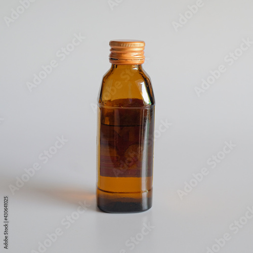 Amber glass cosmetic bottles mockup on white