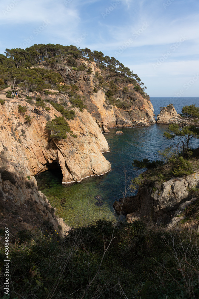 Creek in the mediterranean sea. Small private beach hidden in the rocks