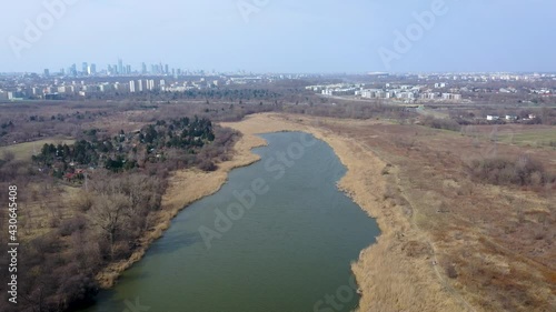 Aerial 4k video of Lake Czerniakowskie Nature Reserve Lake in Mokotow area of Warsaw city, Poland photo