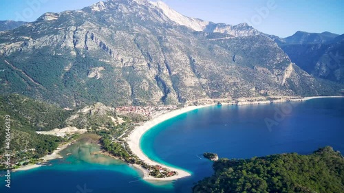 Amazing high angle top drone view on world famous paragliding and parasailing turkish spot for extrim parachute sport in Oludeniz in Fethiye, Turkey
 photo