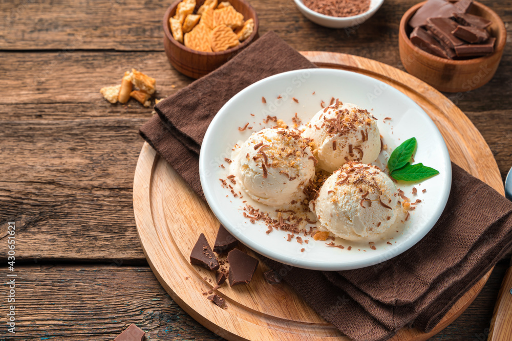 Chilled summer dessert, creamy ice cream on a brown background. Chilled summer dessert, creamy ice cream on a brown background.