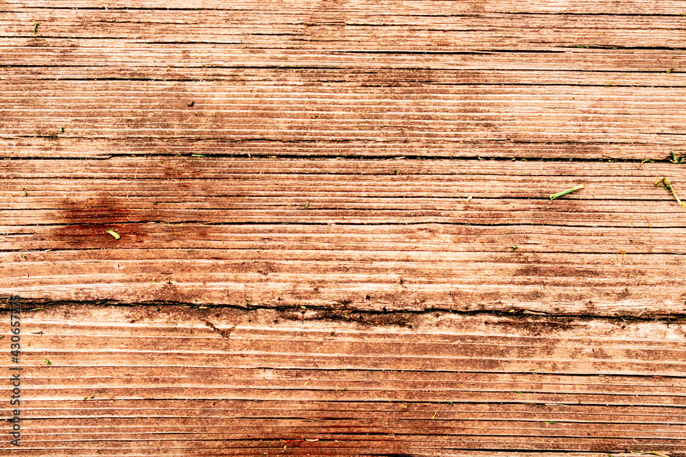 Wooden texture with scratches and cracks. It can be used as a background Wooden texture with scratches and cracks. It can be used as a background