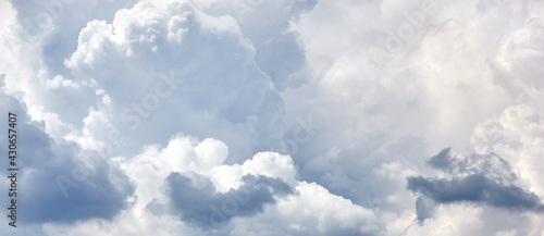 Abstract image of blurred sky. Blue sky background with cumulus clouds