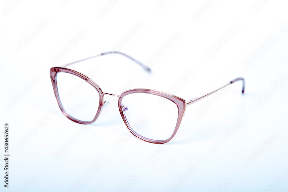 Fototapeta premium Eyeglasses on white background with copyspace