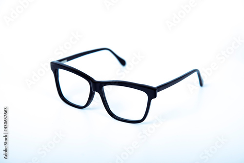 Eyeglasses on white background with copyspace