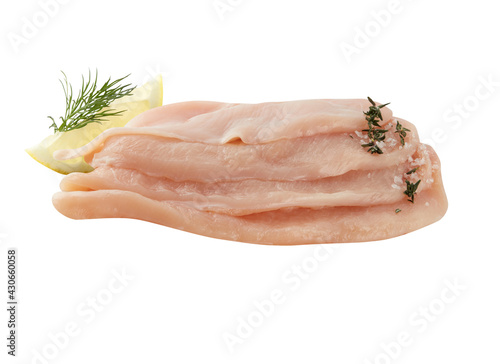 Raw pork cut into pieces, paired with lemon isolated     on white background​ with​ clipping​ path​