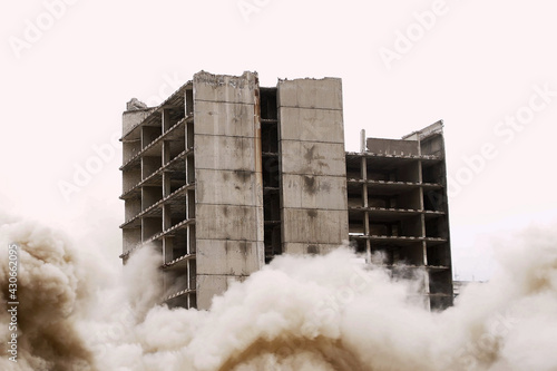 Building demolition by controlled implosion