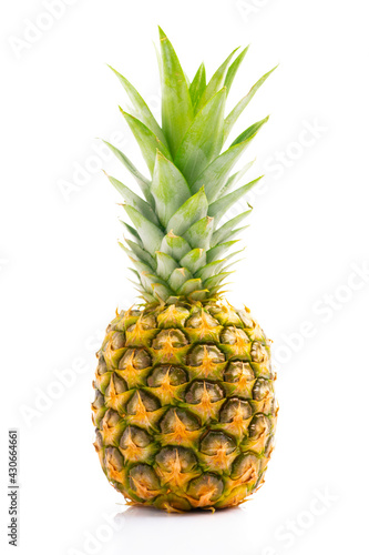 Ripe and delicious pineapple on white background