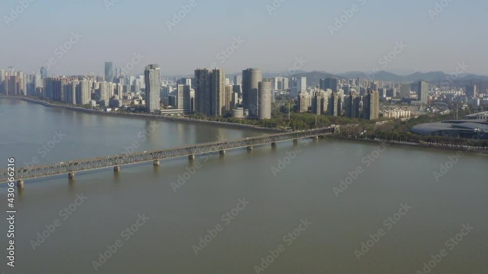 Aerial view of Qiantang River Bridge and modern city skyline in Hangzhou, China Aerial view of Qiantang River Bridge and modern city skyline in Hangzhou, China