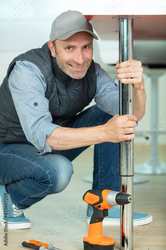 cropped shot of engineer working on a table